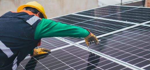 solar technician installing solar panel